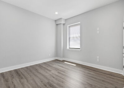 Interior room with hardwood floors and high ceilings at Dickinson Lofts luxury lofts for rent