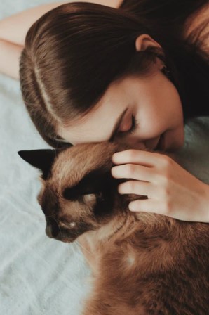 Woman petting her cat